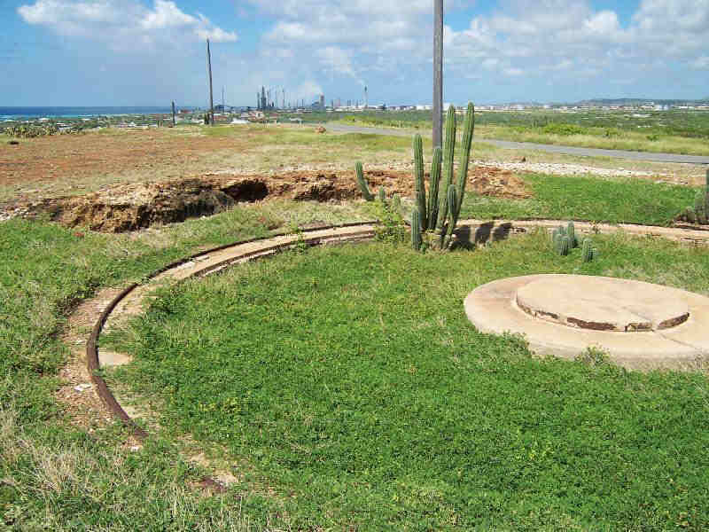 With all the rains lately, the greenery is creeping over everything.  This old WW2 gun turret base was just all rocks the last time that I visited here.